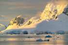 Antarctica, Paradise Bay. Mountain reflections at sunset. Art Print